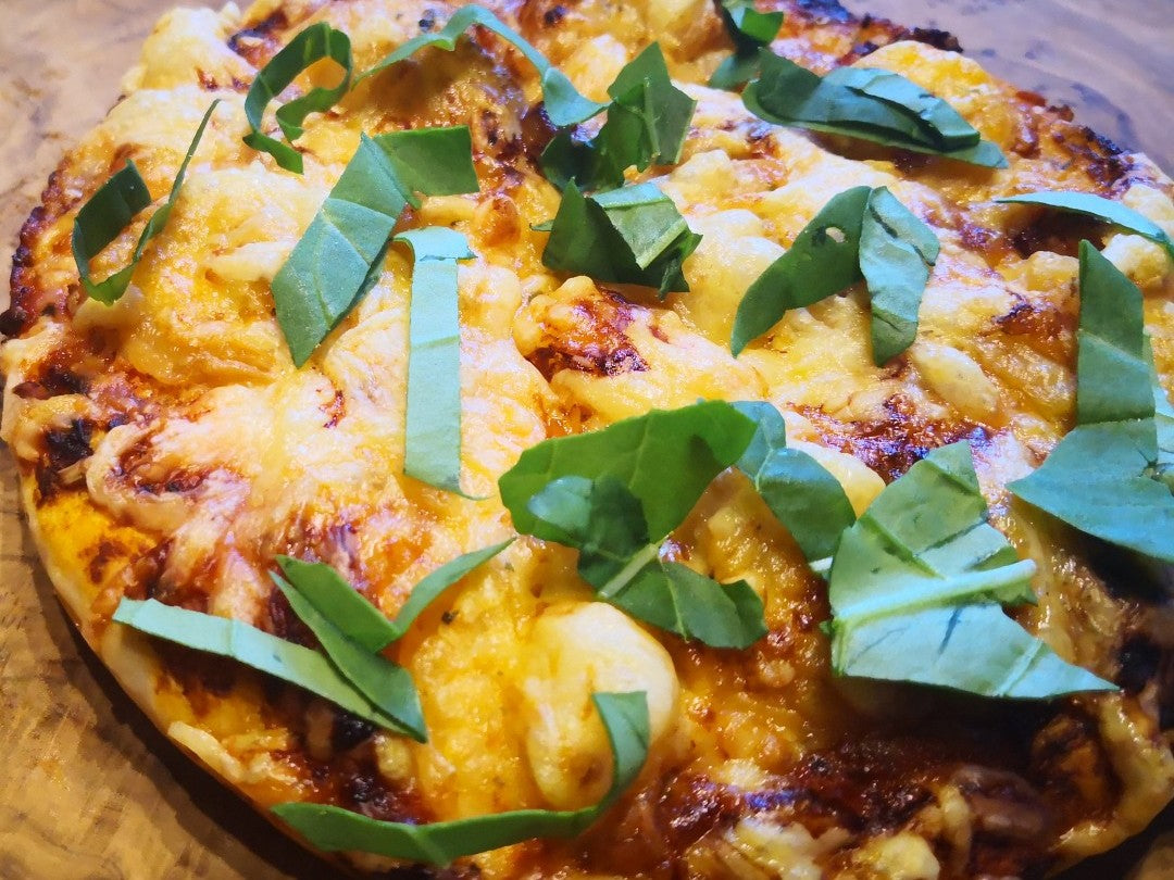 Pizza Rugamba | Heissluftfritteuse Rezept Exotische Fusion in der Heißluftfritteuse: Pizza Rugamba mit afrikanischem Flair und unwiderstehlichem Geschmack
