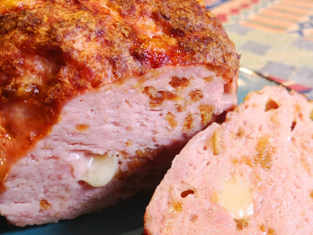 Leberkäse mit Röstzwiebeln und Bergkäse | Rezept